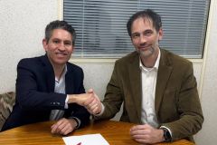 Raymond G. Coles, President of SMG Pixis, and Henning Meier, Sales Director of Kolbus