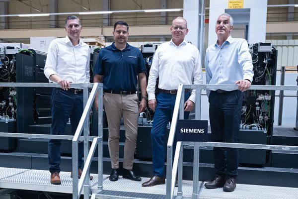 C. Steinma�l of Koenig & Bauer, S. Kimmich, CEO of Koenig & Bauer, Mr. Thomas, VP of Factory Automation at Siemens, C. Ziegenbalg of Koenig &