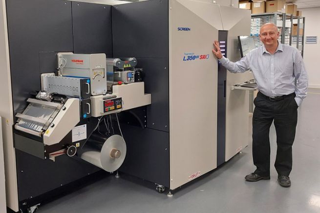 Dr. Adrian Steele, Managing Director of Mercian Labels and the SCREEN L350 SAI E UV inkjet printer.