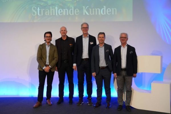 Markus Wei from Koenig & Bauer, Oliver Cynamon from GC, Ralf Sammeck from Koenig & Bauer, Wolfgang Jeschke from GC and Peter Jeschke from